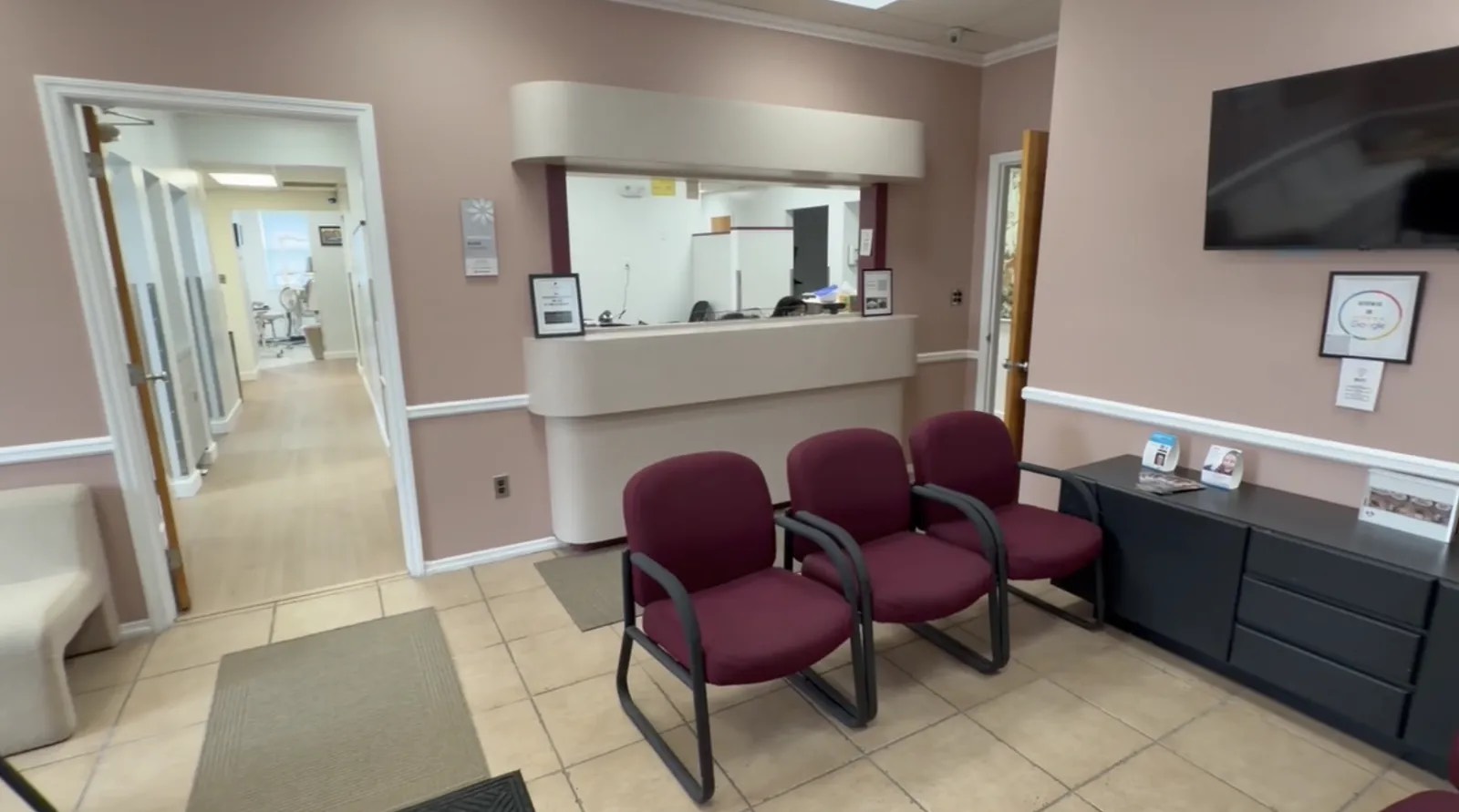 Front desk and waiting area inside All Island Dentistry